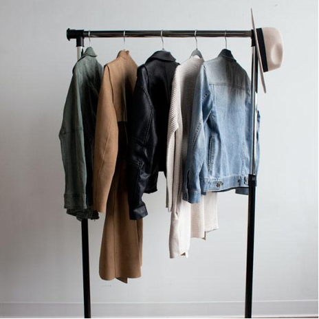 Rack of clothing for a brand photo shoot.